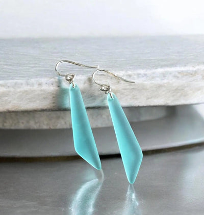 Wire wrapped long sea glass earrings in aqua blue with sterling silver hooks for beach weddings and everyday wear